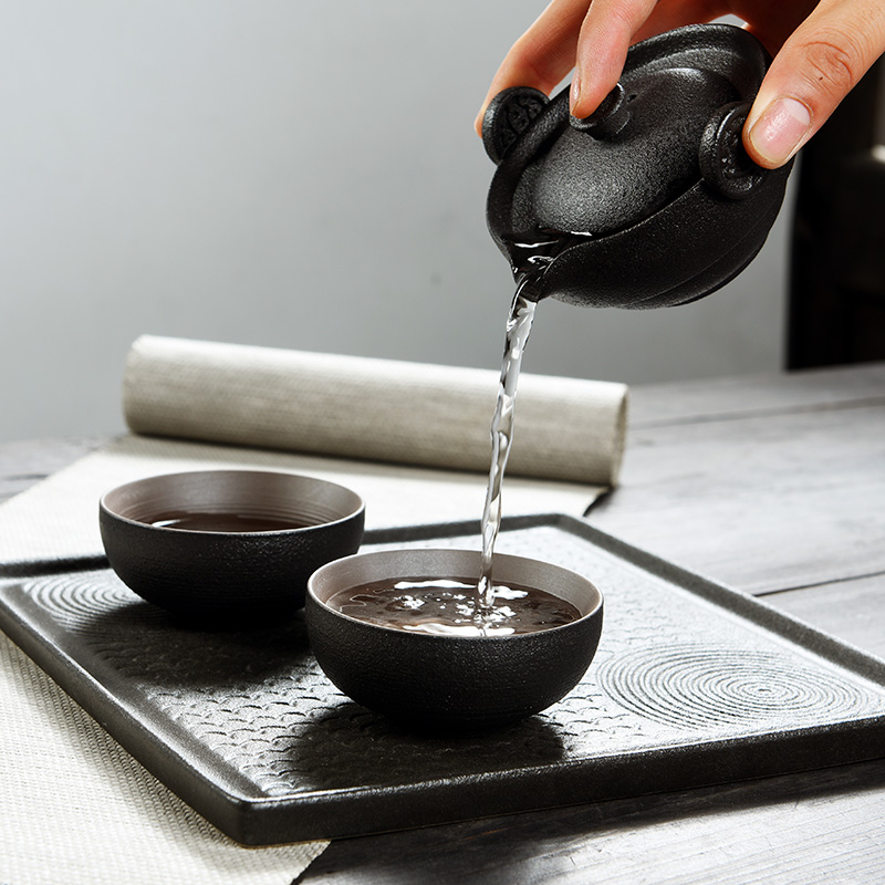 The cabinet ceramic tea tray was Japanese contracted home travel crack cup a pot of two cups of portable kung fu tea set