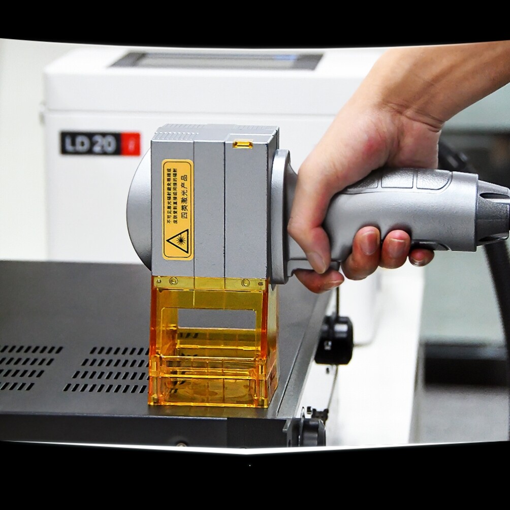 Laser engraving machine Small portable hand-mobile metal stainless steel engraving machine handheld pendulum stall printing lettering