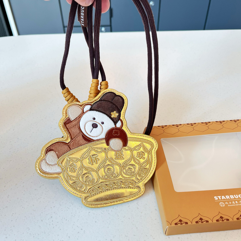 Starbucks Little Bear 2026 Museum Collaboration Series Double Swallow Pattern Gold Bowl Design Bear Store Manager Pendant Decoration Starbucks Little Bear 2026 Museum Collaboration Series Double Swallow Pattern Gold Bowl Design Bear Store Manager Pendant Decoration