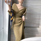 French retro high-end dress autumn and winter temperament goddess fan design niche gentle V-neck knitted long skirt