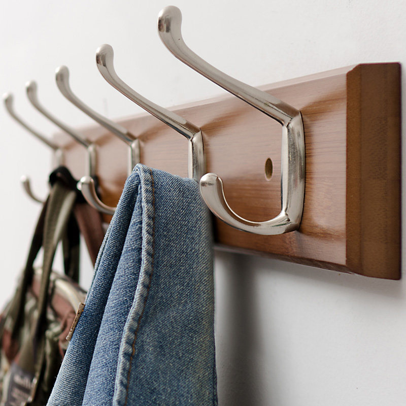 Hanging clothes hanger wall-mounted wall free from punching into the door opening clothing cap wall hanging clothes hook Xuanguan creative clothes hanger