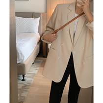 White suit jacket female 2021 spring new loose temperament small senior design niche jacket