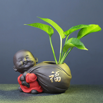 Tea table ornaments high-end tea pet ornaments boutique can raise purple sand little monk Zen hydroponic vase tea set accessories