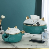 Lucky Cat кладет украшения на бумажные салфетки, простой современный легкий роскошный стиль элитного дома, гостиной, журнальный столик, бумажная коробка с дистанционным управлением