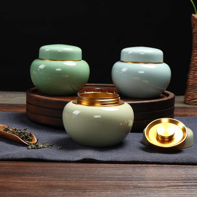 Pro-rhyming green porcelain Chinese tea leaf pot ceramic small number storage tank portable round sealed tea pot tea accessories