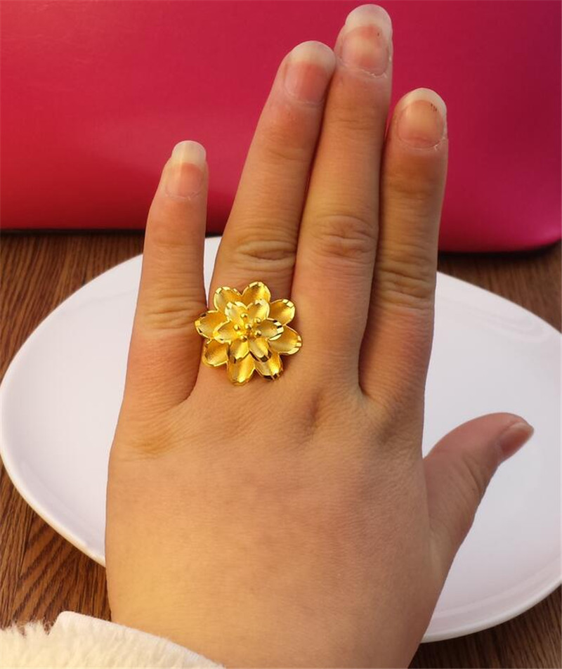 Vietnam Sha Jin Glossy Flower Nữ Mô phỏng Cặp đôi mạ vàng Nhẫn vàng khai trương Quà tặng cô dâu không màu lâu dài nhẫn titan