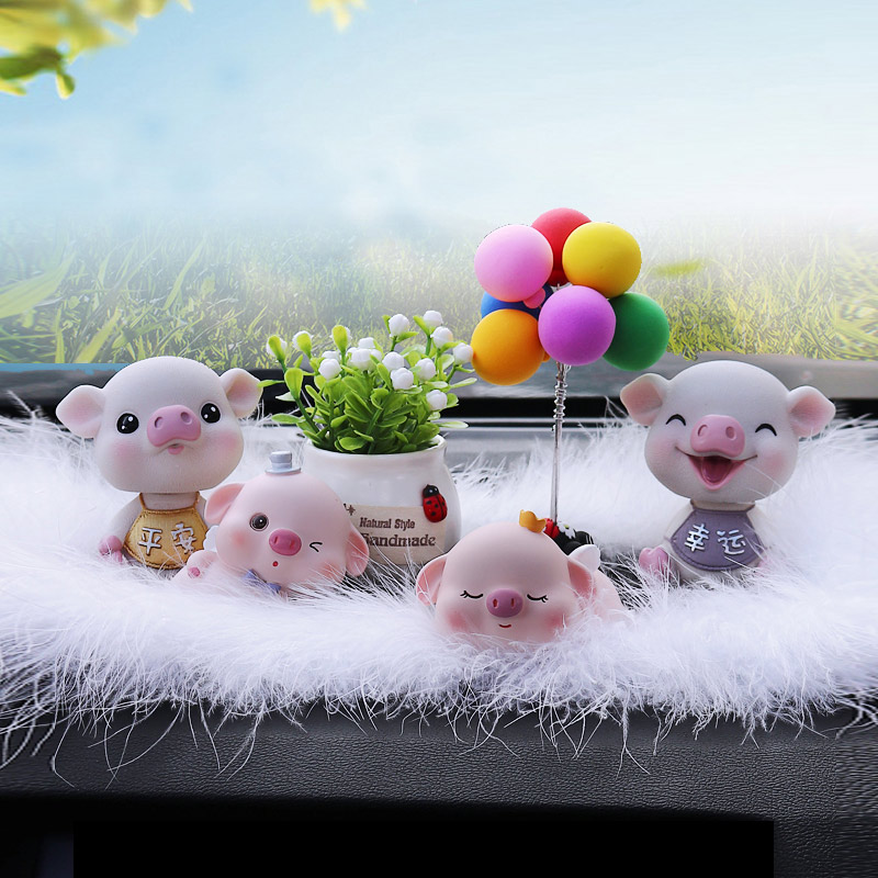 Car decoration creative cute car high-end interior shaking head pig men and women net red car car interior products Daquan