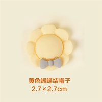 Желтая шапка с бантиком