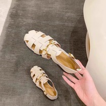 Hong Kong genuine leather 100 lap Baotou woven shoes 2024 Summer new horse title button Retro to the Roman sandal women