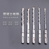 Распространите удар с электрическим молотком через стену, две ямы, две слоты, круглую ручку, четыре ямы, квадратная ручка бетонной цементной стены алмаз