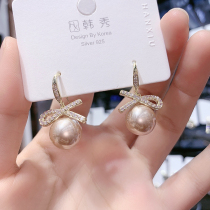 South Koreas Dongdaemun exquisite zircon bow pearl earrings light luxury high-end temperament fashion net red ear jewelry