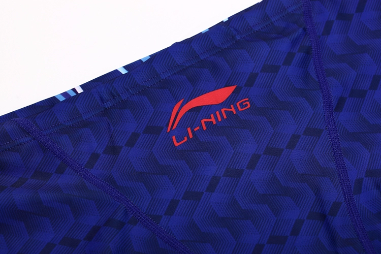 Li Ning quần bơi nhanh khô chuyên nghiệp Quần boxer nam 5 điểm quần bơi cho nam Quần bơi kích thước lớn nước nóng phù hợp với đồ bơi - Nam bơi đầm