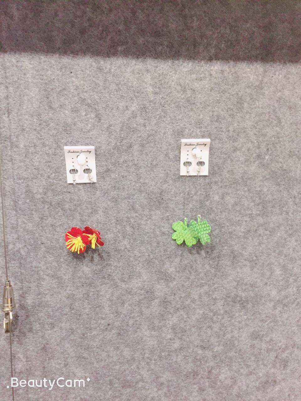 Craft gifts, tourist souvenirs, fish skin products, sterling silver earrings, four-leaf clover, meaning lucky for yourself