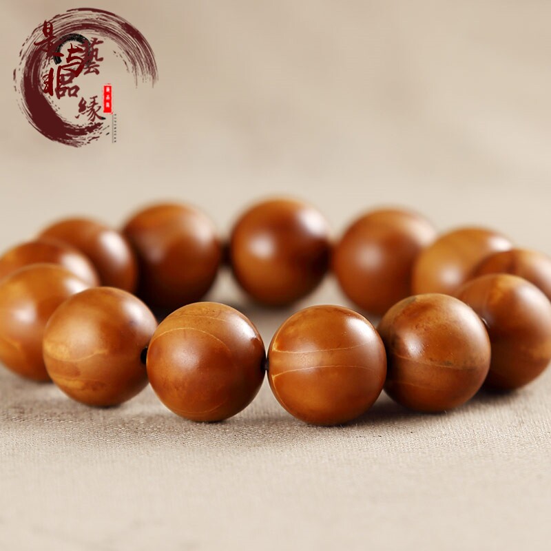 Yes and non-Merlin iron core olive core bracelet is exactly round, no leaks and no complements, olive Hu round beads play hand chisel