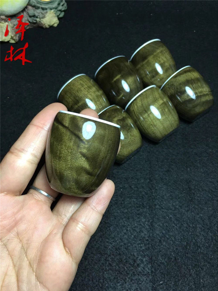 Gold silk nanmu tea cup gold silk nanmu gloomy wood wine cup tea set solid wood whole material hollowed out wood carving craft decoration gift