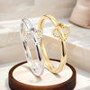 Non-fading, high-end light luxury temperament four-leaf clover hollow titanium steel ring for women 18K gold trendy versatile plain ring