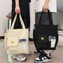 Canvas bag mens trendy crossbody bag Japanese casual 2023 new ins large capacity student shoulder handbag