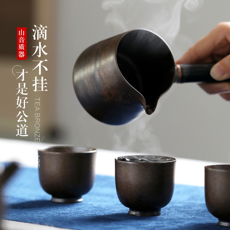 Bronze glaze jingdezhen fair keller appliance with the large ceramic tea set and a cup of tea is tea accessories and CPU