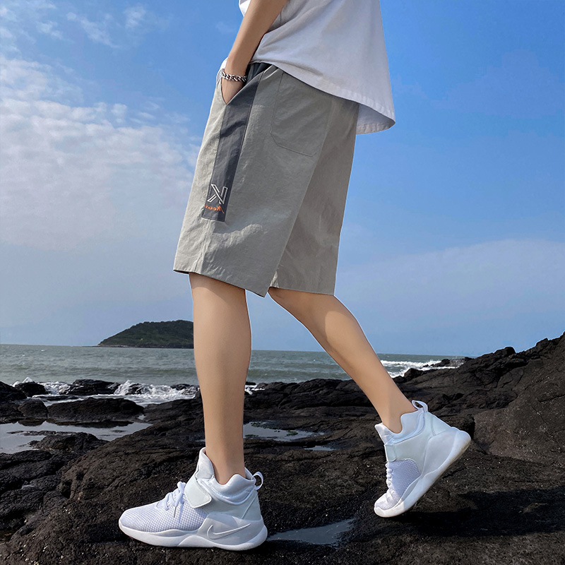 2020 mùa hè mới quần short nam giới thường Hàn Quốc phiên bản của xu hướng lỏng lẻo thẳng thể dục thể thao sọc quần ngựa triều