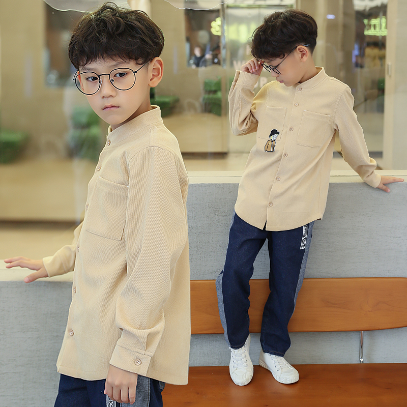 Chàng trai mùa thu váy cotton kẻ sọc áo dài tay 2019 mùa xuân mới và áo sơ mi trắng mùa thu trẻ em lớn của áo phiên bản Chao Hàn Quốc.