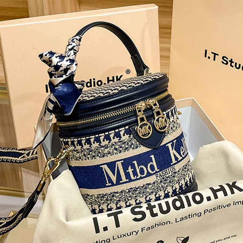 Hong Kong's light luxury counter women's bag 2022 new houndstooth cylinder bag shoulder sloping hand-held bucket bag chest bag