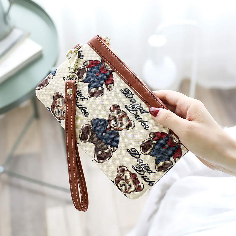 2023 New tide hands with a long wrist wrists wrapper bag female bear handbag bag bag
