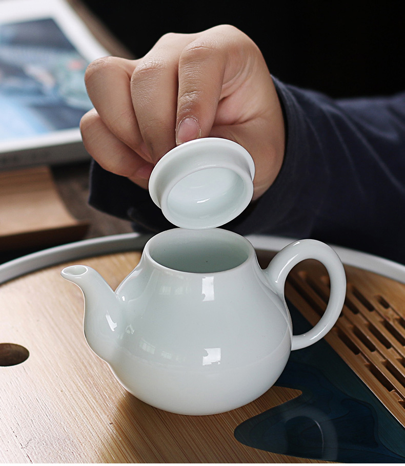 Really hold high white porcelain tea set household contracted teapot teacup water storage of a complete set of kung fu tea table dry terms plate