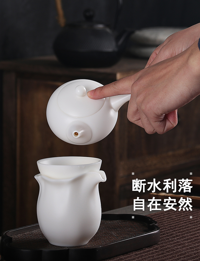 True sheng Chinese white dehua white porcelain kung fu tea set sealed ball hole side put the pot of tea of a complete set of gift set