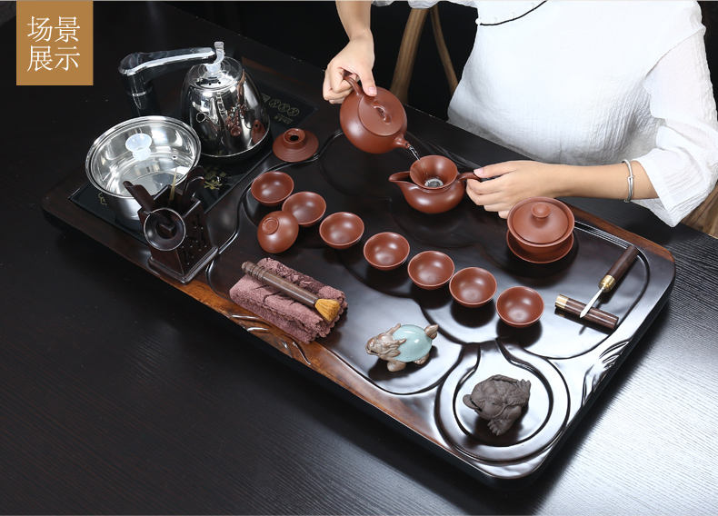 Really hold a complete set of ebony suit household kung fu tea tray tea sets tea cup tea tea kettle automatically