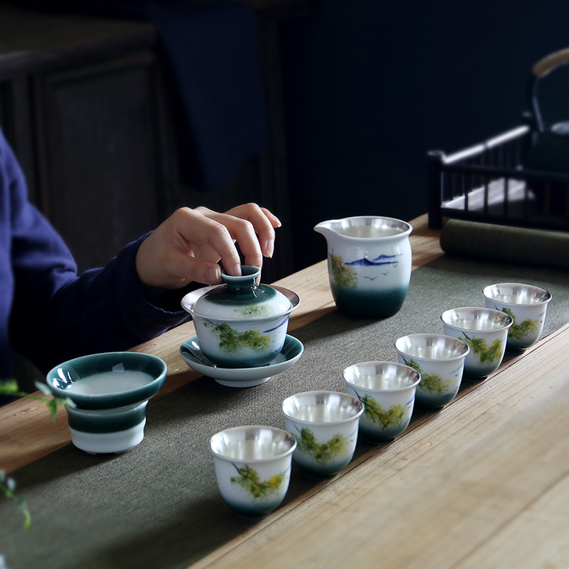 Really sheng white porcelain hand - made tea set household sand coppering. As silver cup lid to use kung fu tea tea tray