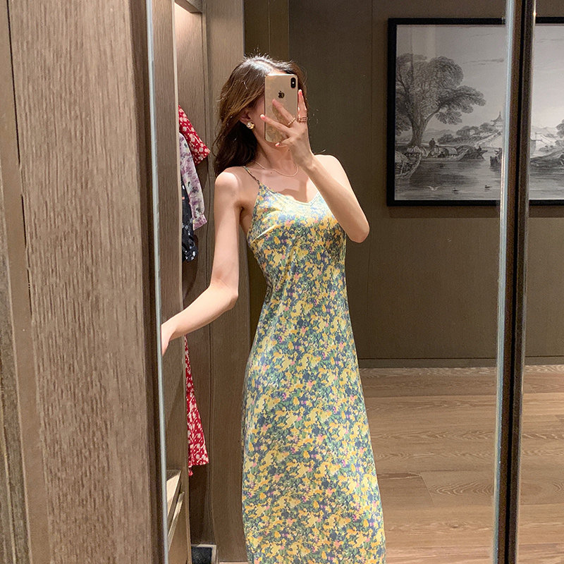 Suspender long skirt female summer retro oil painting style 2021 new first love broken flower small fresh seaside holiday beach skirt