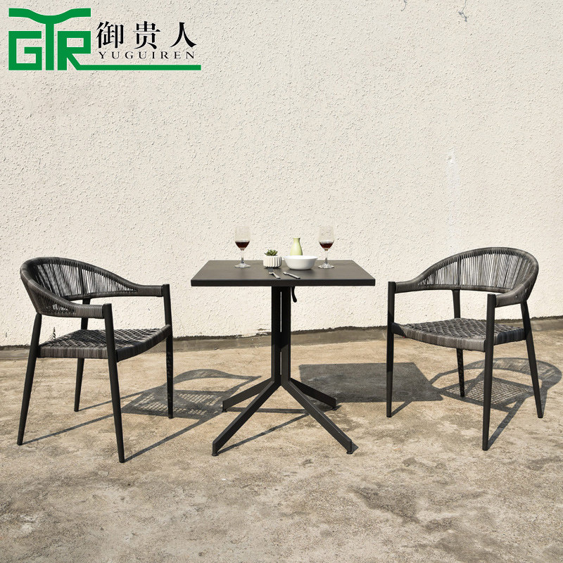 Royal noble Nordic leisure table and chair Outdoor rattan woven table and chair three-piece garden Balcony rattan chair Coffee table combination