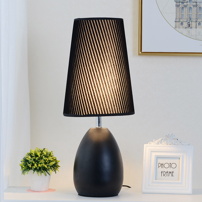 Modern minimal bedroom bedroom headlights creative personality living room room room decoration table lamp