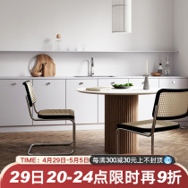 Rock plate solid wood dining table and chairs combined Nordic modern medieval with light and luxurious minimalist and round water grinding stone dining table