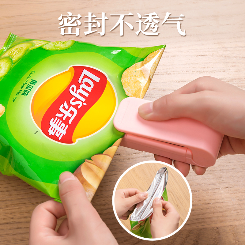 Portable mini sealing machine food sealing machine snack plastic bag sealing artifact household small hand pressure heat sealing machine