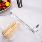 Deli 14888 вакуумная машина упаковочная машина домохозяйство маленькая мини -консервация запечатываемая машина.