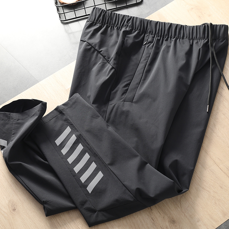 Nice pants worn in summer with light and breathable silk sliding night vision reflective new men sports casual pants