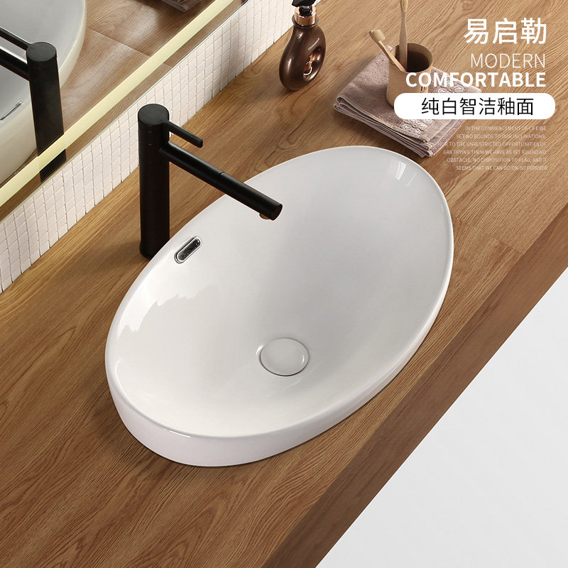 Deepen the semi-recessed table basin above the table basin oval bathroom ceramic Taizhong basin washbasin washbasin hotel