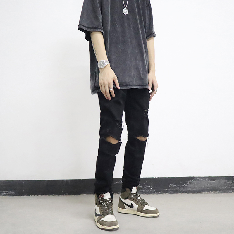 Pocket INS European and American high street pants black pit hole hole hole hole tide jeans men and women autumn winter trousers