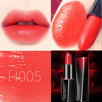 A red coral orange in the mouth of a nectar.