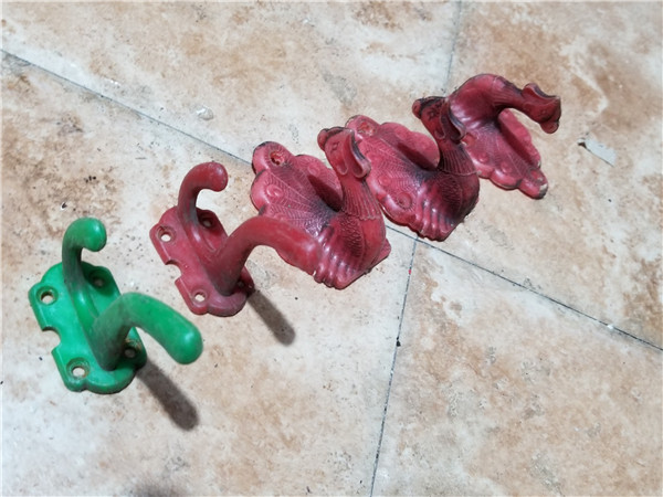 The old clothes are hooked to the peacock.