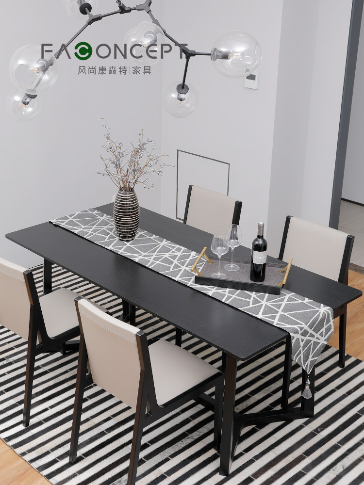 Nordic dining table and chair combination Modern simple small apartment dining room rectangular black acorn wood color 4 people with a dining table