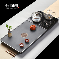 Shima said that the whole piece of Wujin stone tea tray tea set fully automatic integrated induction cooker tea table simple household tea sea