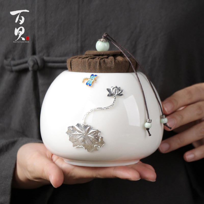 White ceramic silver tea cans new ceramic sealing cans high white jade storage tea warehouse small black tea cans wake tea cans