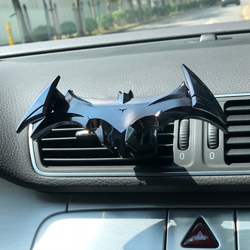 Gravity induction car mobile phone bracket 2021 new car air outlet creative support suction cup paste anti-shake