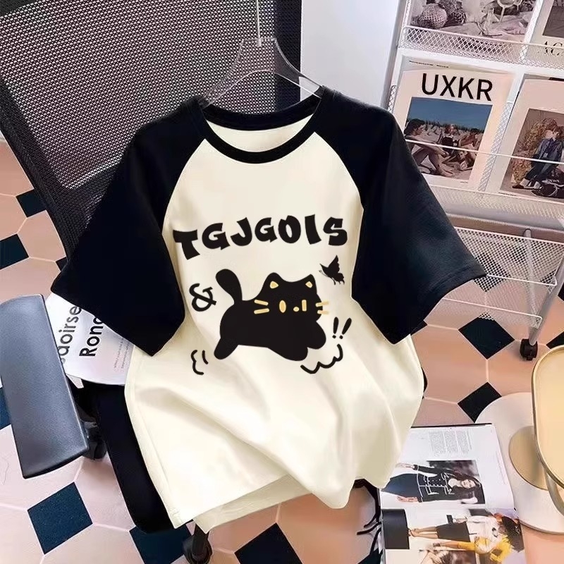 女の子用中・大サイズの子供用半袖Tシャツ、ゆったりコットン、2025年夏の新スタイル、ラグランスリーブ、コントラストカラーのボトムシャツトップス