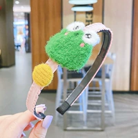 Зеленая лягушка темно -желтая