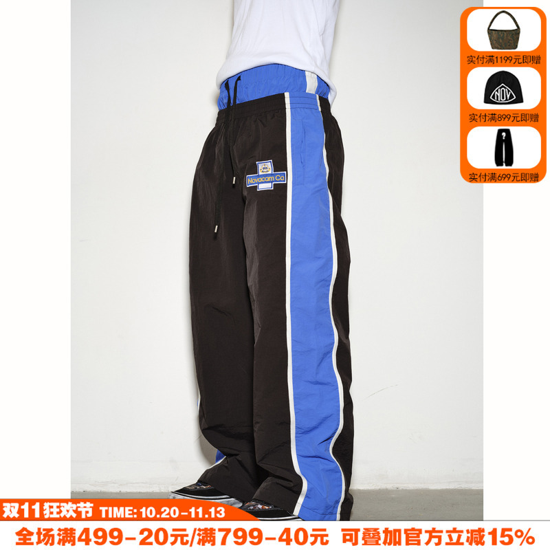Novacam American Retro Casual Embroidered Logo Sports Nylon Faux Two-Piece Hiking Pants with a Curved Silhouette Novacam American Retro Casual Embroidered Logo Sports Nylon Faux Two-Piece Hiking Pants with a Curved Silhouette