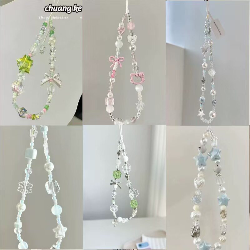 A collection of cute short phone straps and CCD camera phone cases/accessories, popular on Xiaohongshu (Little Red Book).