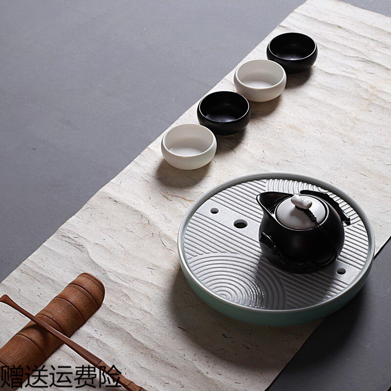Whole set of Gongfu Tea furniture set small cover Home Creative Tea Road Purple Sand Teapot Tea Tray Dry Bubble Table Ceramic Tea Cup